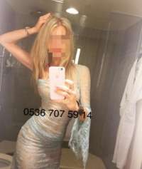 Kusursuz Tasarım - Türk Escort Kızın Kıvırcık Saçları ve Ateşli Güzelliği
